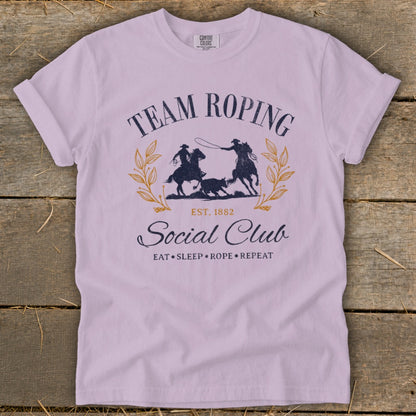 Team Roping Social Club graphic t-shirt with horses, bull, and text.