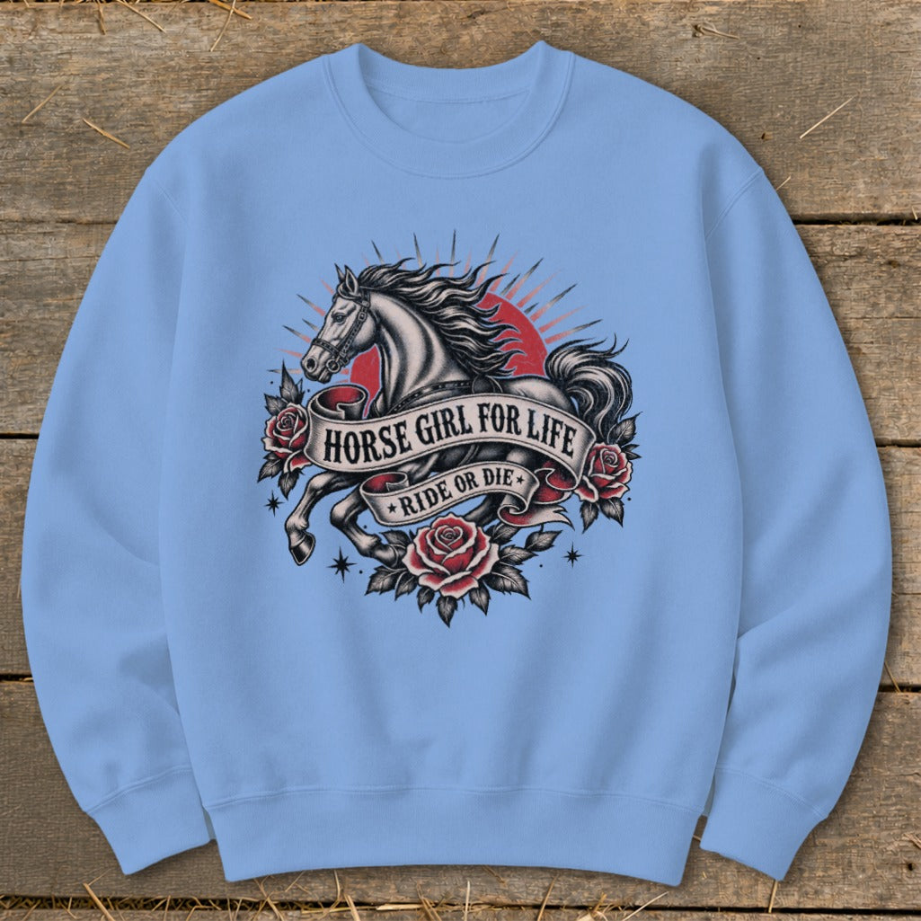 Light blue sweatshirt with a vintage tattoo design featuring a horse, roses, and banners.