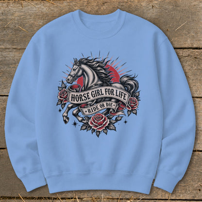 Light blue sweatshirt with a vintage tattoo design featuring a horse, roses, and banners.