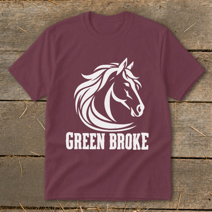 Maroon short-sleeved t-shirt featuring a white graphic of a horse head and the text GREEN BROKE.