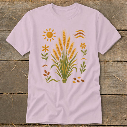 Light pink t-shirt with a wheat stalk design and surrounding floral and sun elements.