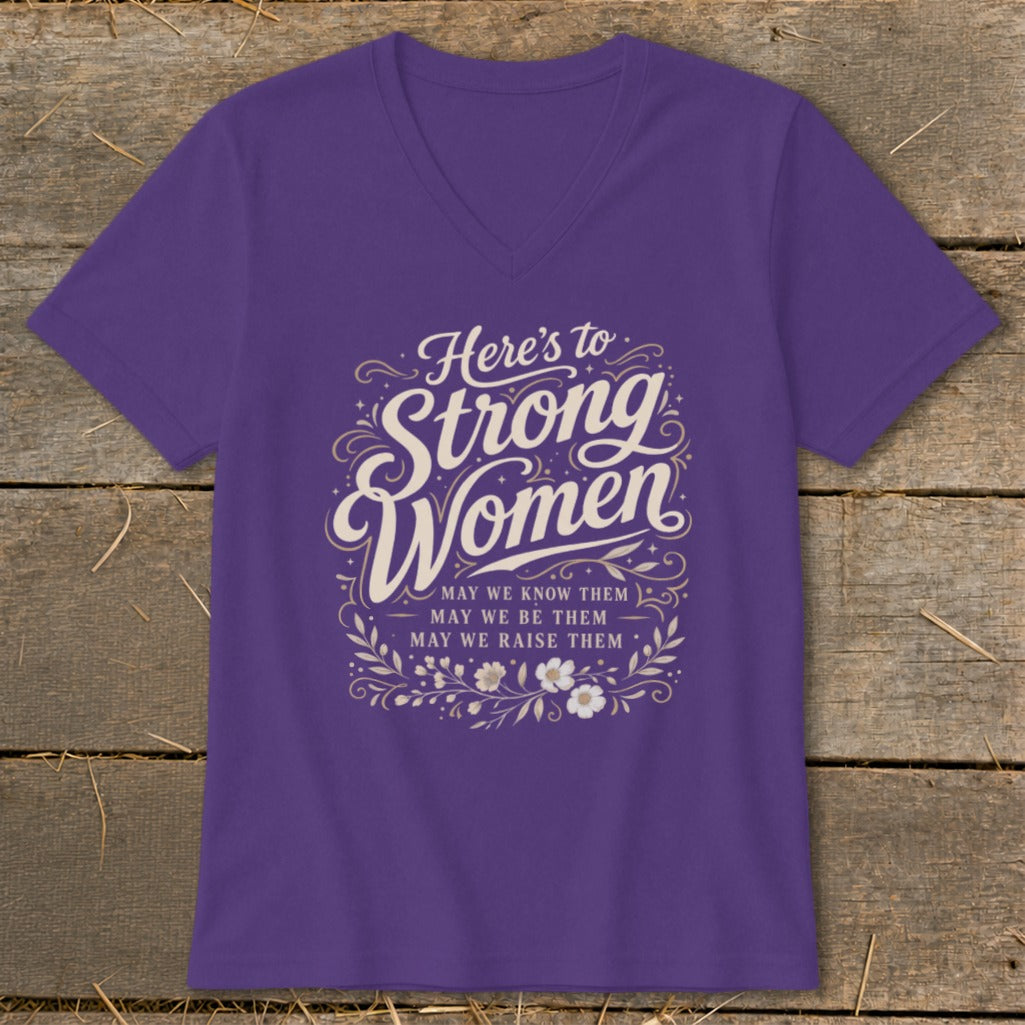 Purple t-shirt with "Here's to Strong Women" and floral design.