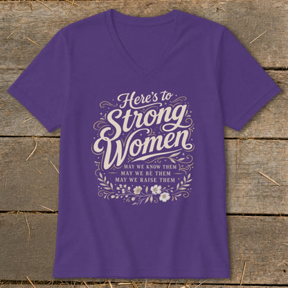 Purple t-shirt with "Here's to Strong Women" and floral design.