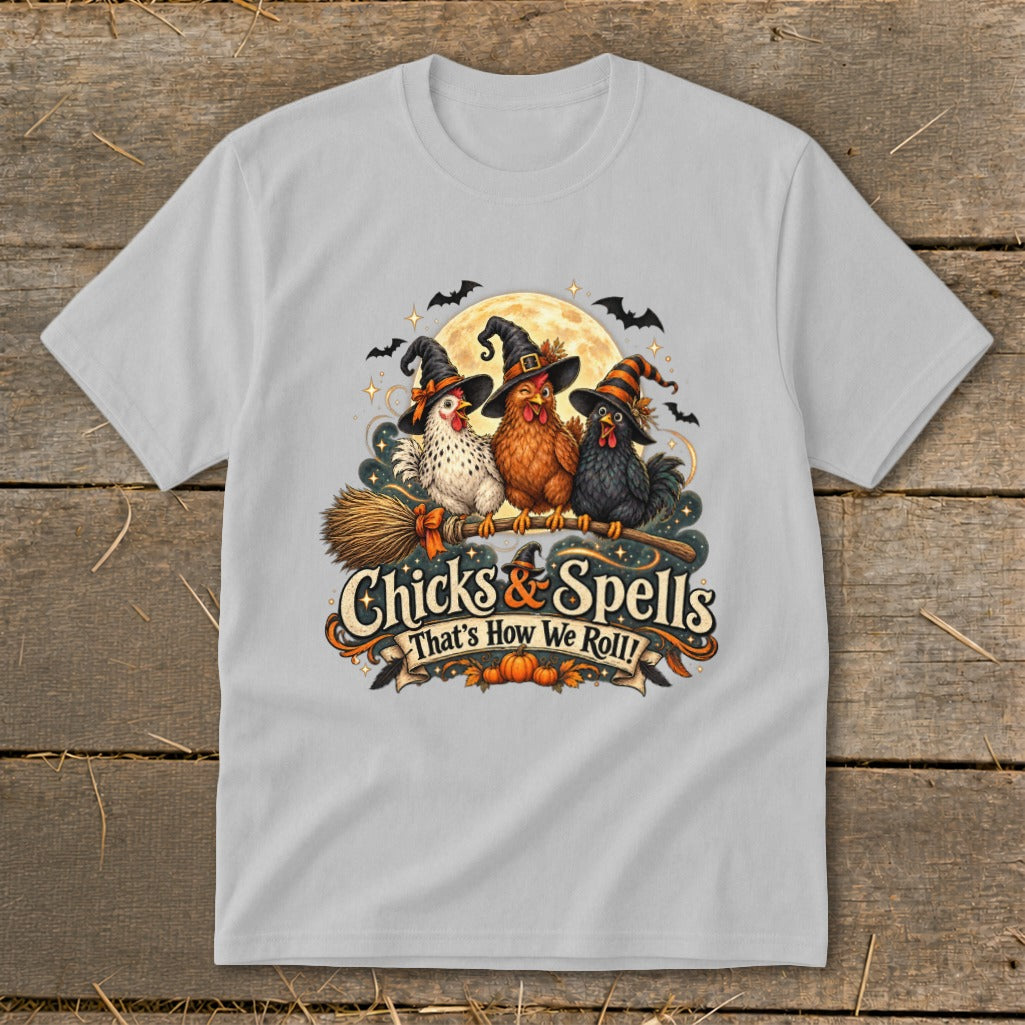 Three witches' chickens in hats on a broomstick with "Chicks & Spells" text.