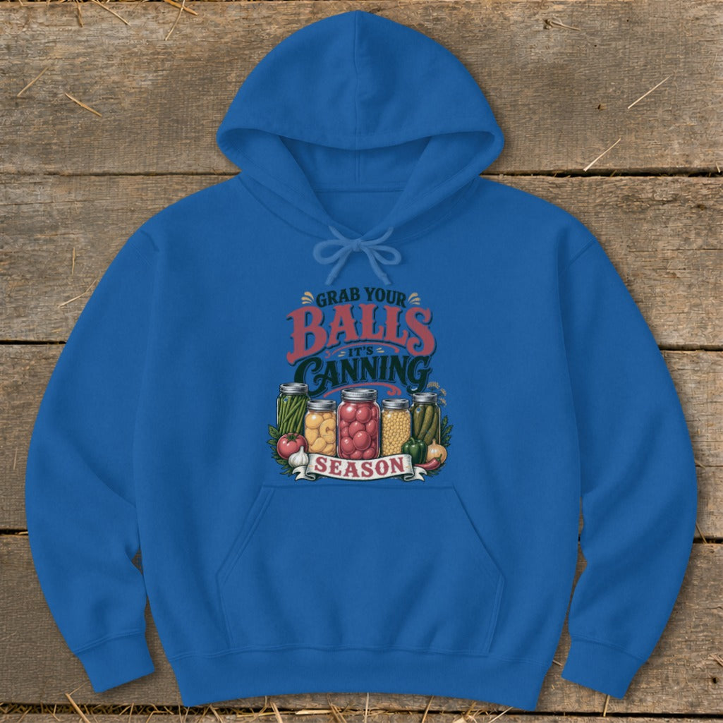 Blue hoodie with graphic "Grab Your Balls It's Canning Season" and jars of produce.