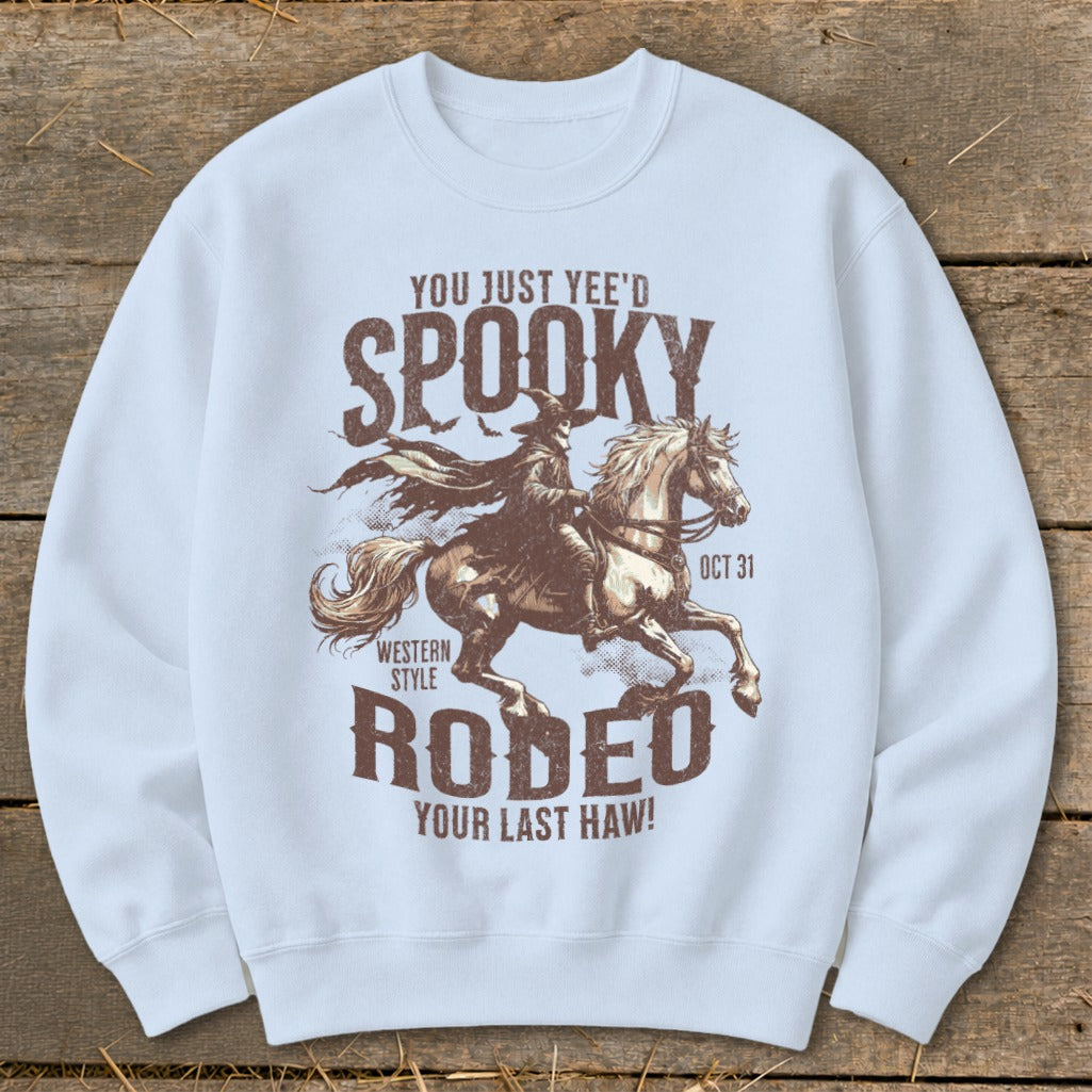 Spooky Western Style Rodeo graphic with a cowboy riding a horse and text "YOU JUST YEE'D SPOOKY".