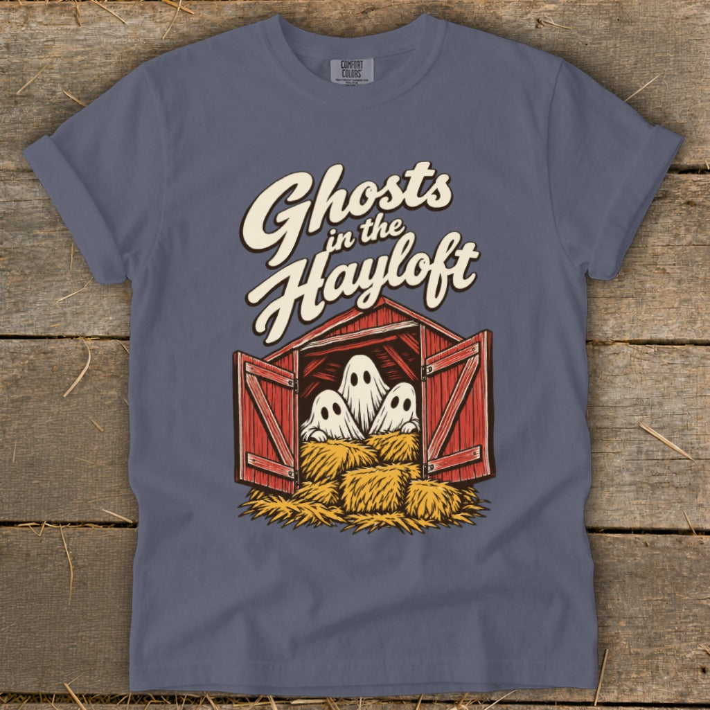 Ghosts in the Hayloft Halloween graphic on a purple t-shirt.