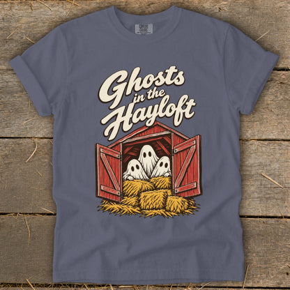 Ghosts in the Hayloft Halloween graphic on a purple t-shirt.