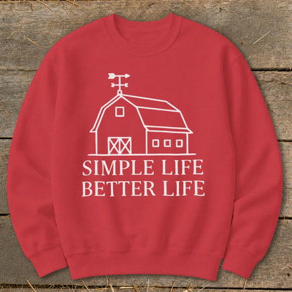 Red sweatshirt with white barn graphic and text "Simple Life Better Life".