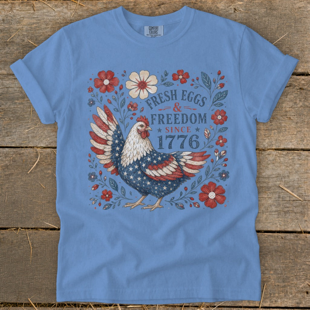 Chicken with American flag wings and "Fresh Eggs & Freedom Since 1776" text.