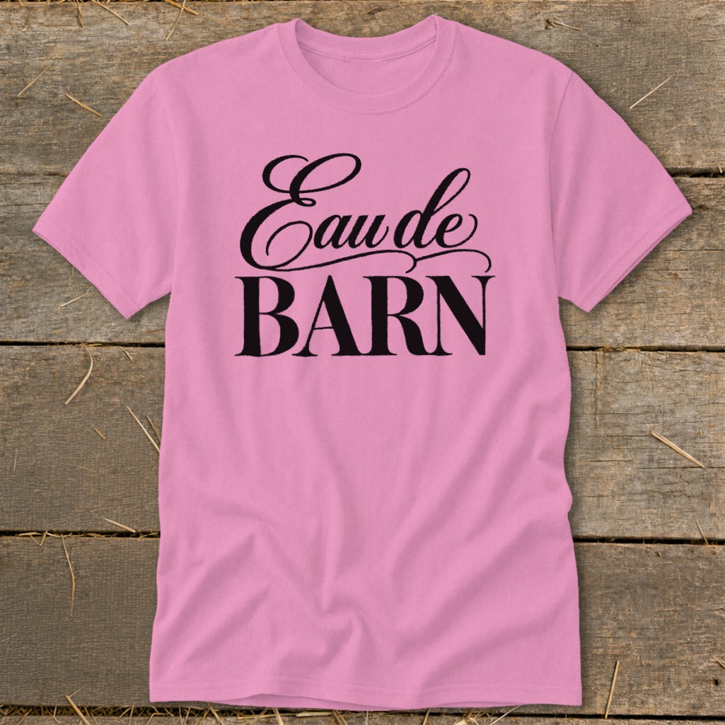 Pink t-shirt with black text "Eau de BARN"