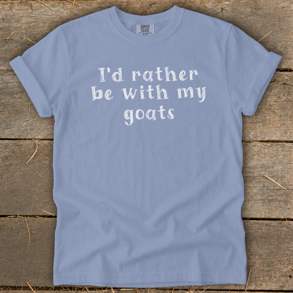 Light blue Comfort Colors t-shirt with white text: "I'd rather be with my goats".