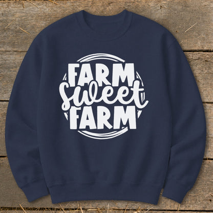 Navy sweatshirt with white text reading "Farm Sweet Farm" in a circular design.