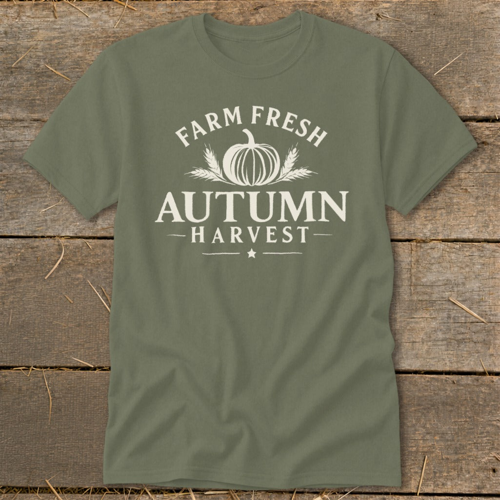 Olive green t-shirt with white text and graphics reading "Farm Fresh Autumn Harvest" and a pumpkin.