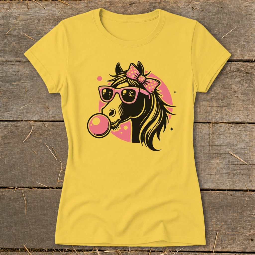 Yellow t-shirt with a black horse wearing pink sunglasses and a pink bow, blowing bubblegum.