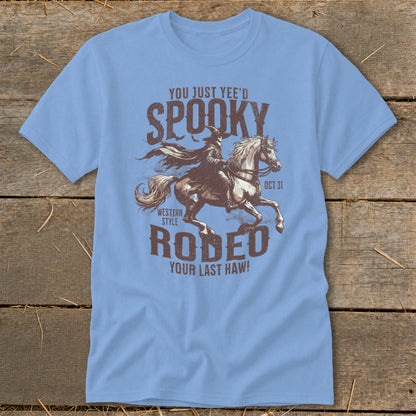 Light blue t-shirt with "You Just Yee'd Spooky Rodeo Your Last Haw!" graphic.