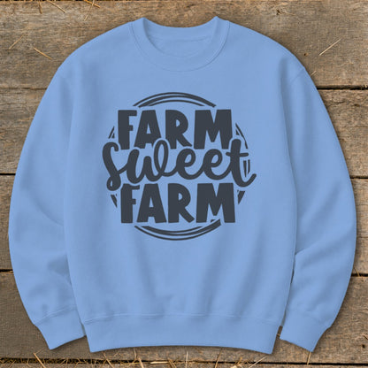 Light blue crewneck sweatshirt with "Farm Sweet Farm" text graphic.