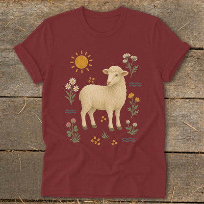 Maroon t-shirt with a cream sheep surrounded by a sun, flowers, and wavy lines.