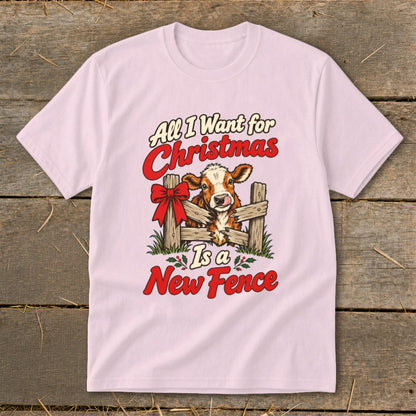 Pink t-shirt with "All I Want for Christmas Is a New Fence" and a cow.