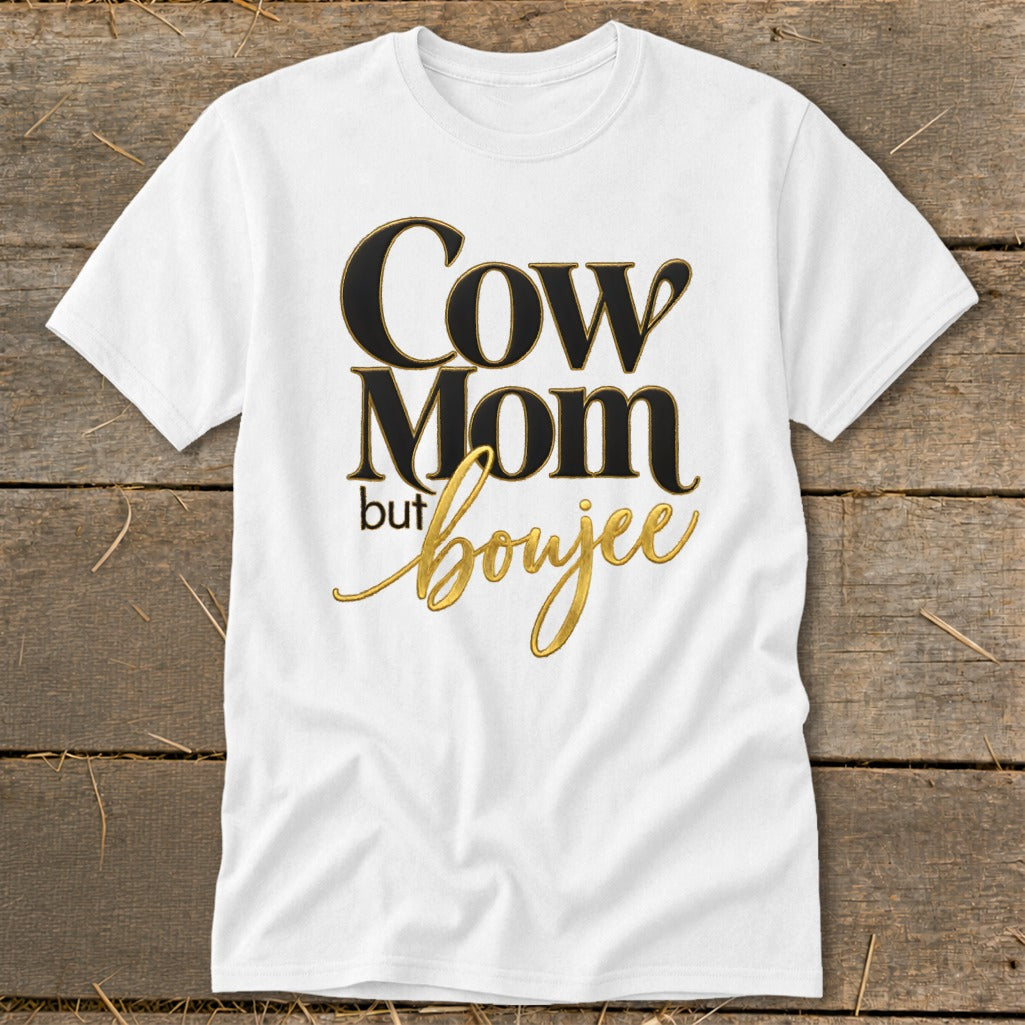 White t-shirt with black and gold text "Cow Mom but boujee".