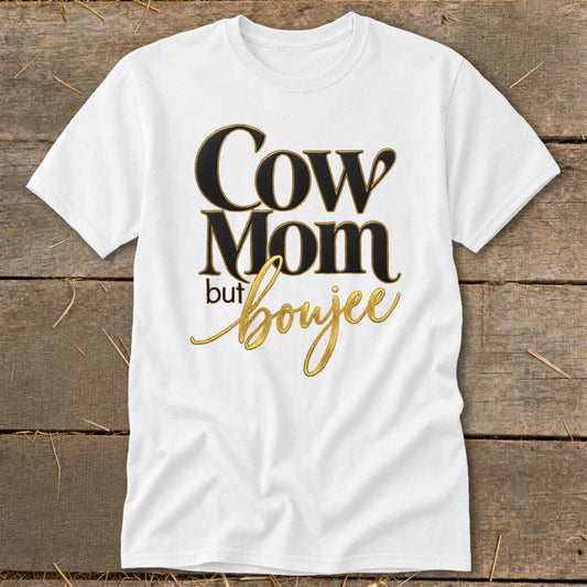 White t-shirt with black and gold text "Cow Mom but boujee".