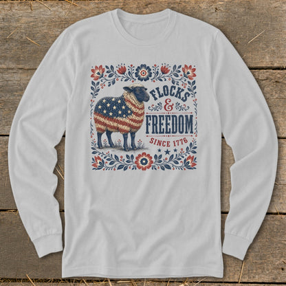 Sheep with American flag pattern and text "Flocks & Freedom Since 1776".