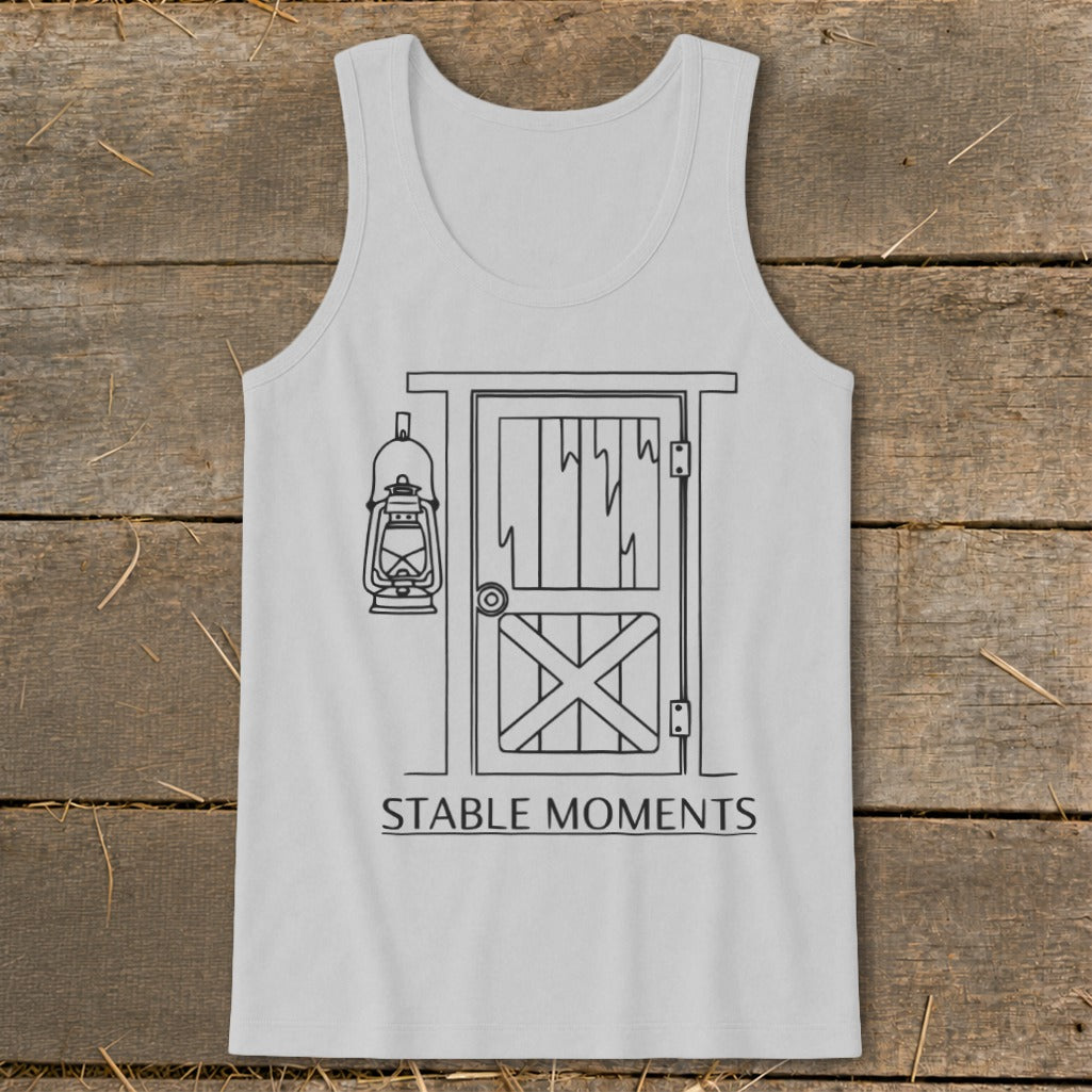 Light grey tank top with a black line drawing of a barn door and lantern, and text "STABLE MOMENTS".