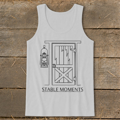 Light grey tank top with a black line drawing of a barn door and lantern, and text "STABLE MOMENTS".