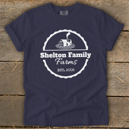 Navy t-shirt with "Shelton Family Farms EST. 2005" and house logo.