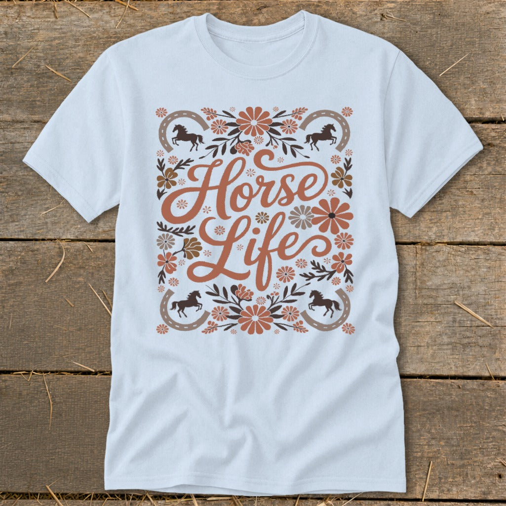 Light blue t-shirt with "Horse Life" text surrounded by horseshoes and flowers.