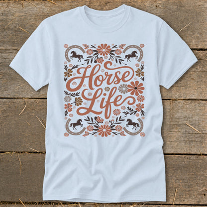 Light blue t-shirt with "Horse Life" text surrounded by horseshoes and flowers.