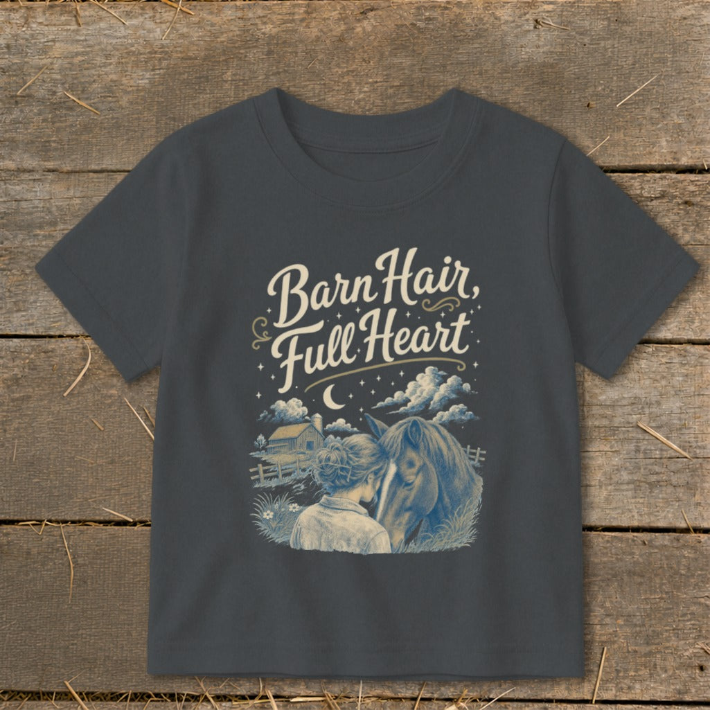 Dark t-shirt with "Barn Hair, Full Heart" text and horse and girl illustration.