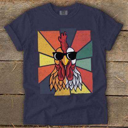 Retro rooster with sunglasses on a vintage sunburst background.