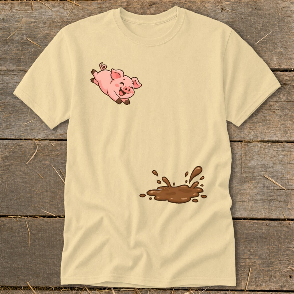 Cream t-shirt with illustration of a happy cartoon pig jumping over a splash of mud.