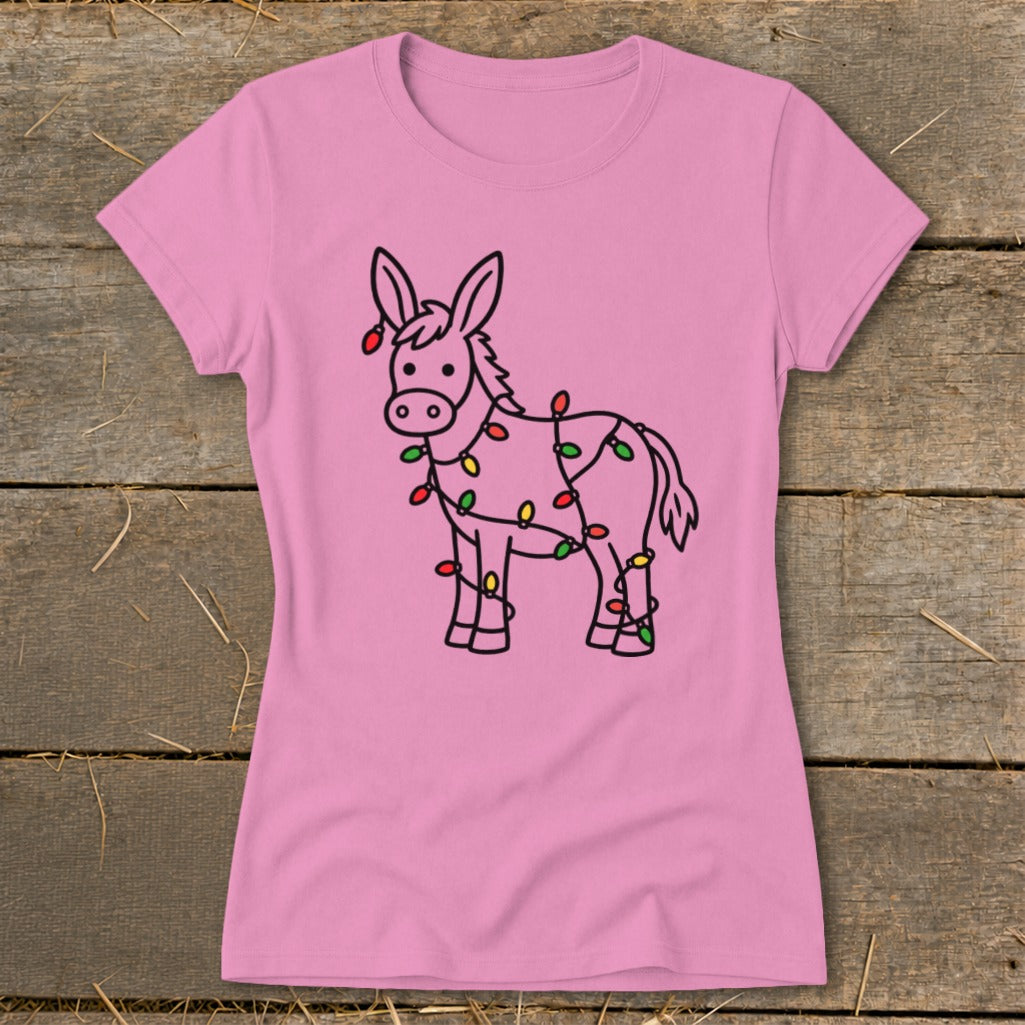 Pink t-shirt with a cartoon donkey wrapped in Christmas lights.