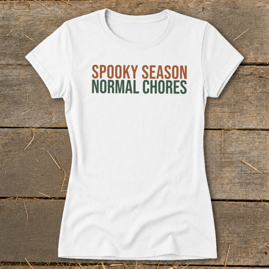 White t-shirt with "SPOOKY SEASON" and "NORMAL CHORES" text.