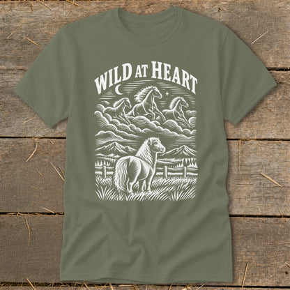 Green t-shirt with white "Wild At Heart" text and horses running above a pasture.