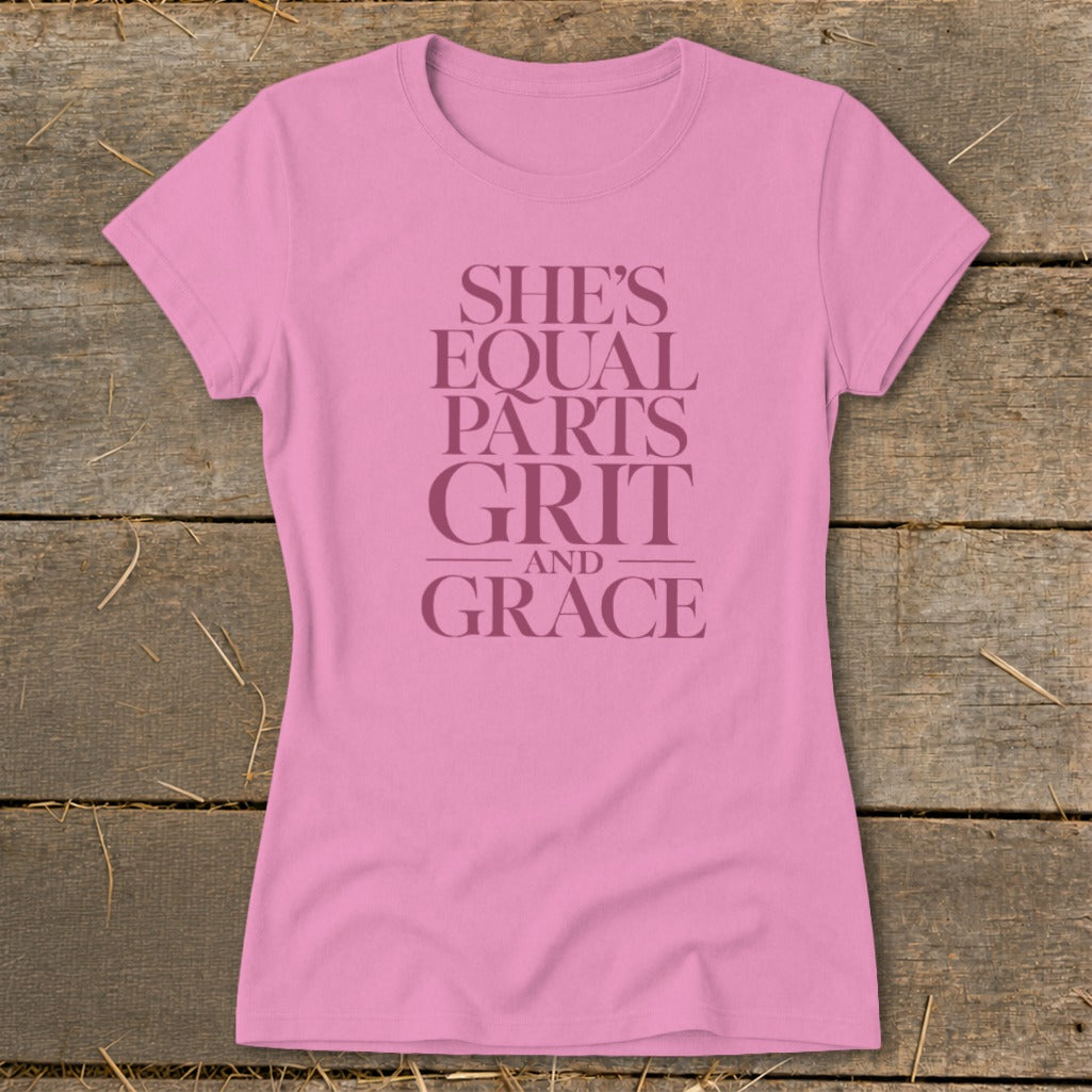 Pink t-shirt with "She's Equal Parts Grit and Grace" text.
