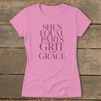 Pink t-shirt with "She's Equal Parts Grit and Grace" text.