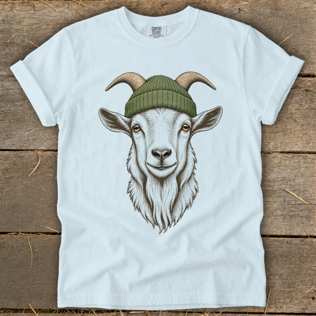 White t-shirt with a detailed illustration of a goat wearing a green knit hat.