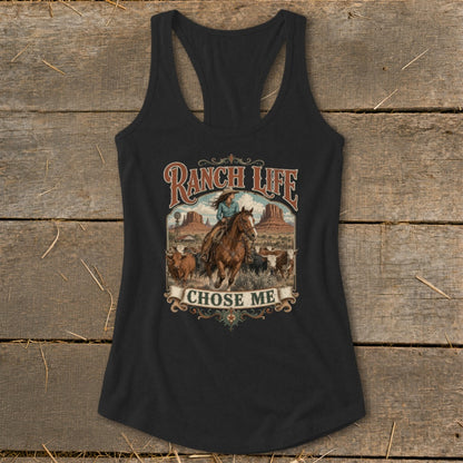 Black tank top with a graphic of a ranch scene, text "RANCH LIFE CHOSE ME".