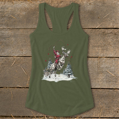 Santa lassoing a moose in a snowy forest, on a green tank top.