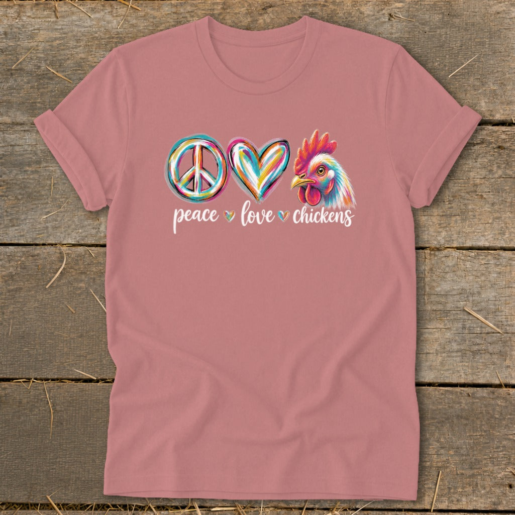 Pink t-shirt with peace, heart, and chicken graphic and "peace love chickens" text.