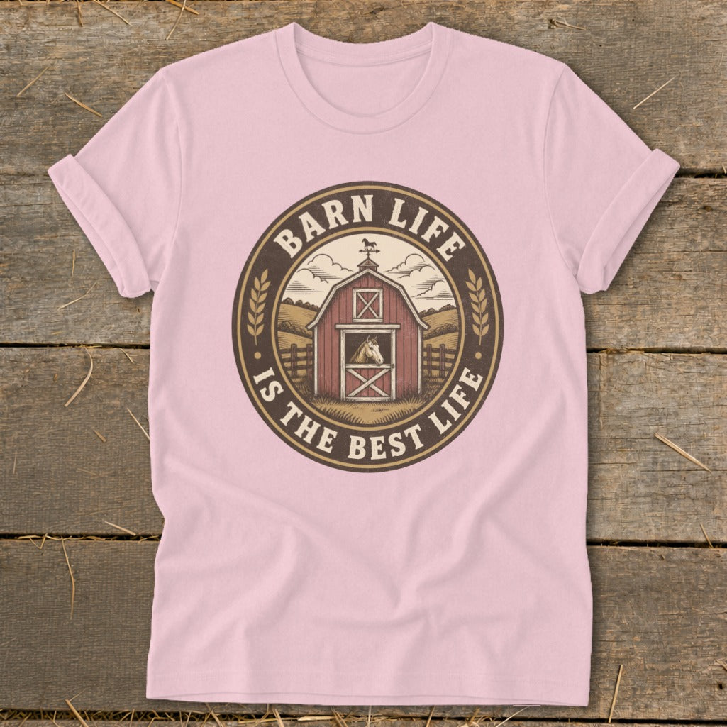 Pink t-shirt with circular graphic featuring a barn, horse, and text "Barn Life Is The Best Life".