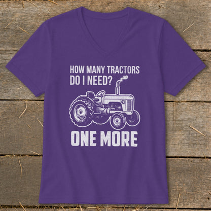 Purple t-shirt with white graphic: "How many tractors do I need? One more."