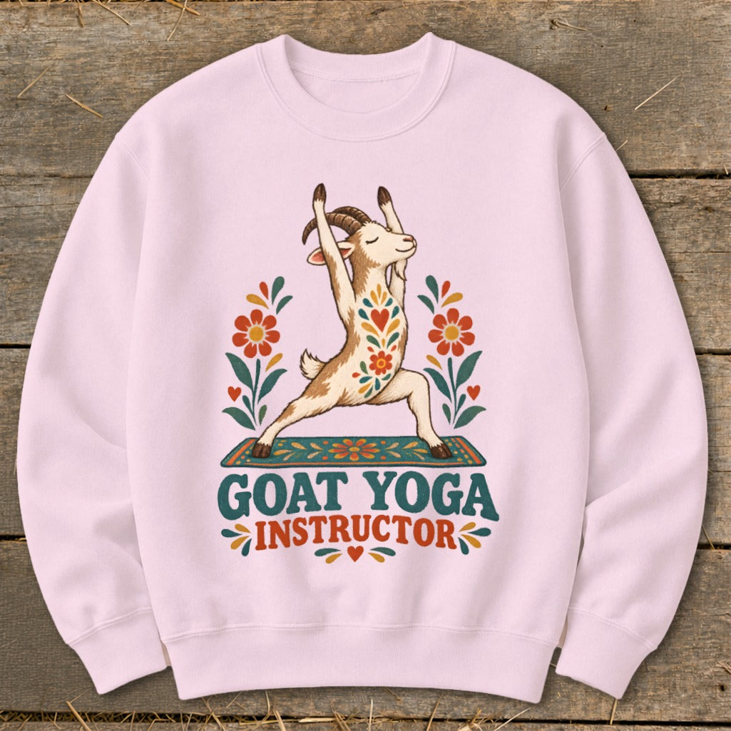 Light pink sweatshirt with a goat doing yoga and "GOAT YOGA INSTRUCTOR" text.