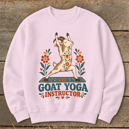 Light pink sweatshirt with a goat doing yoga and "GOAT YOGA INSTRUCTOR" text.