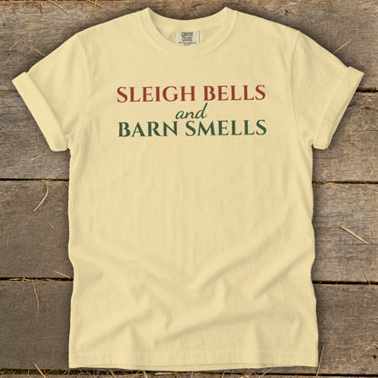Light yellow t-shirt with "Sleigh Bells and Barn Smells" text.