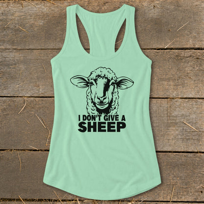 Mint green tank top with a black sheep graphic and text reading "I DON'T GIVE A SHEEP."