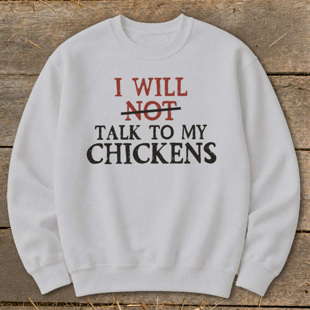 White sweatshirt with "I WILL NOT TALK TO MY CHICKENS" text.